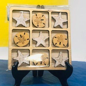 Wooden Tic-Tac-Toe Game, The Board and pieces are made of wood.